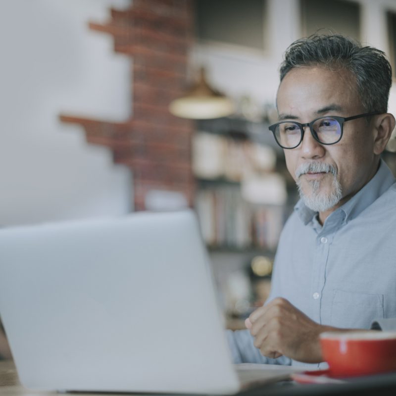 man-attending-online-meeting