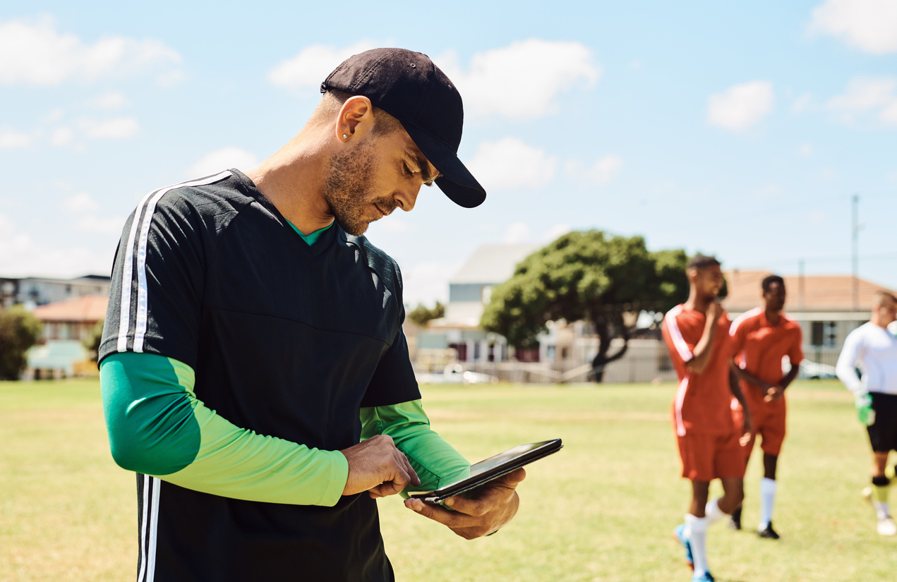 soccer-coach-using-tablet